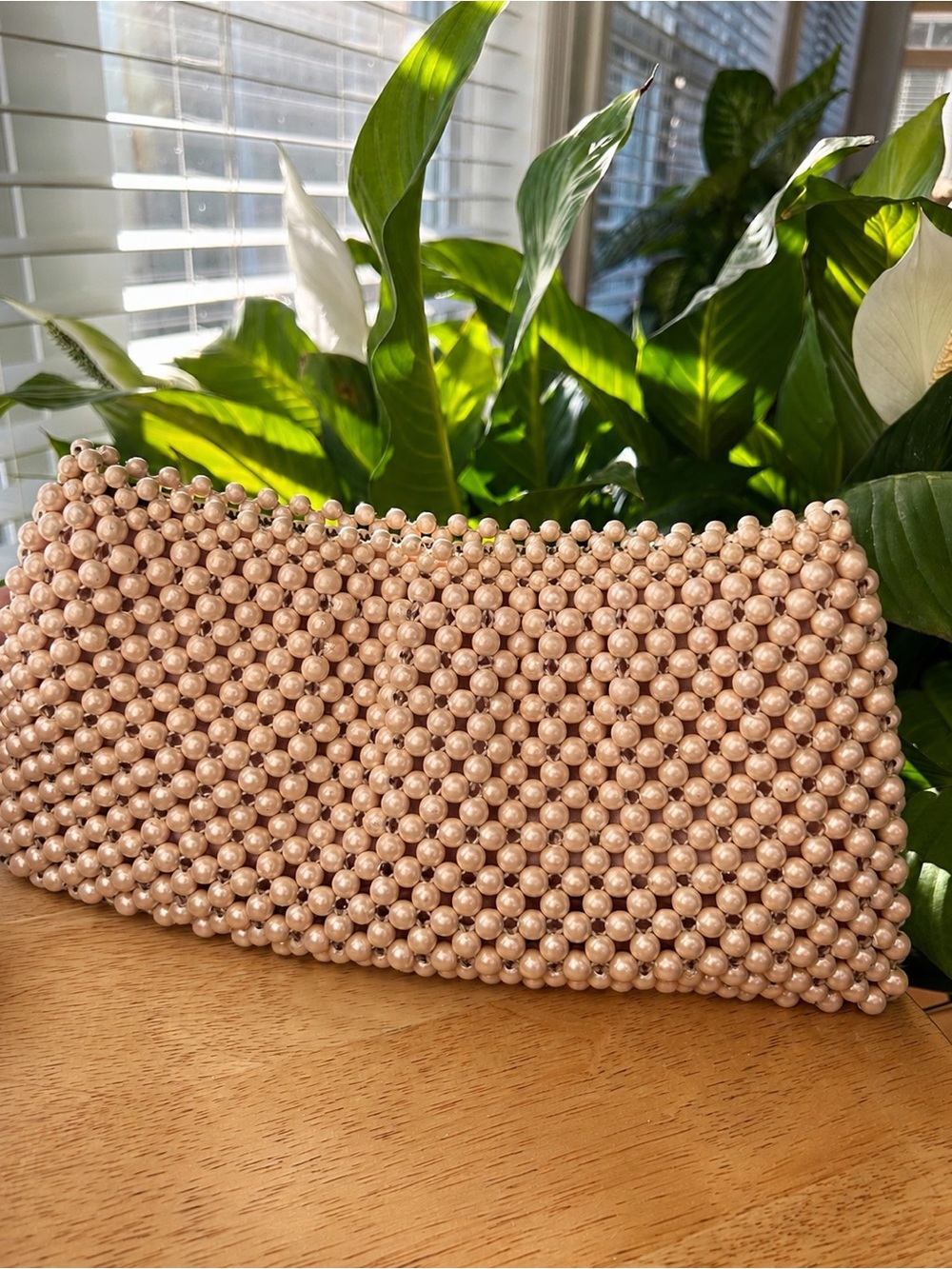 Pearl clutch evening bag with satin interior for wedding